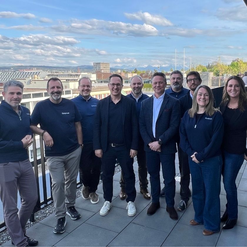 An illustrated graphic featuring a central figure with two silhouettes behind, set against a purple background. The central figure is wearing a collared shirt, depicted in simple lines.