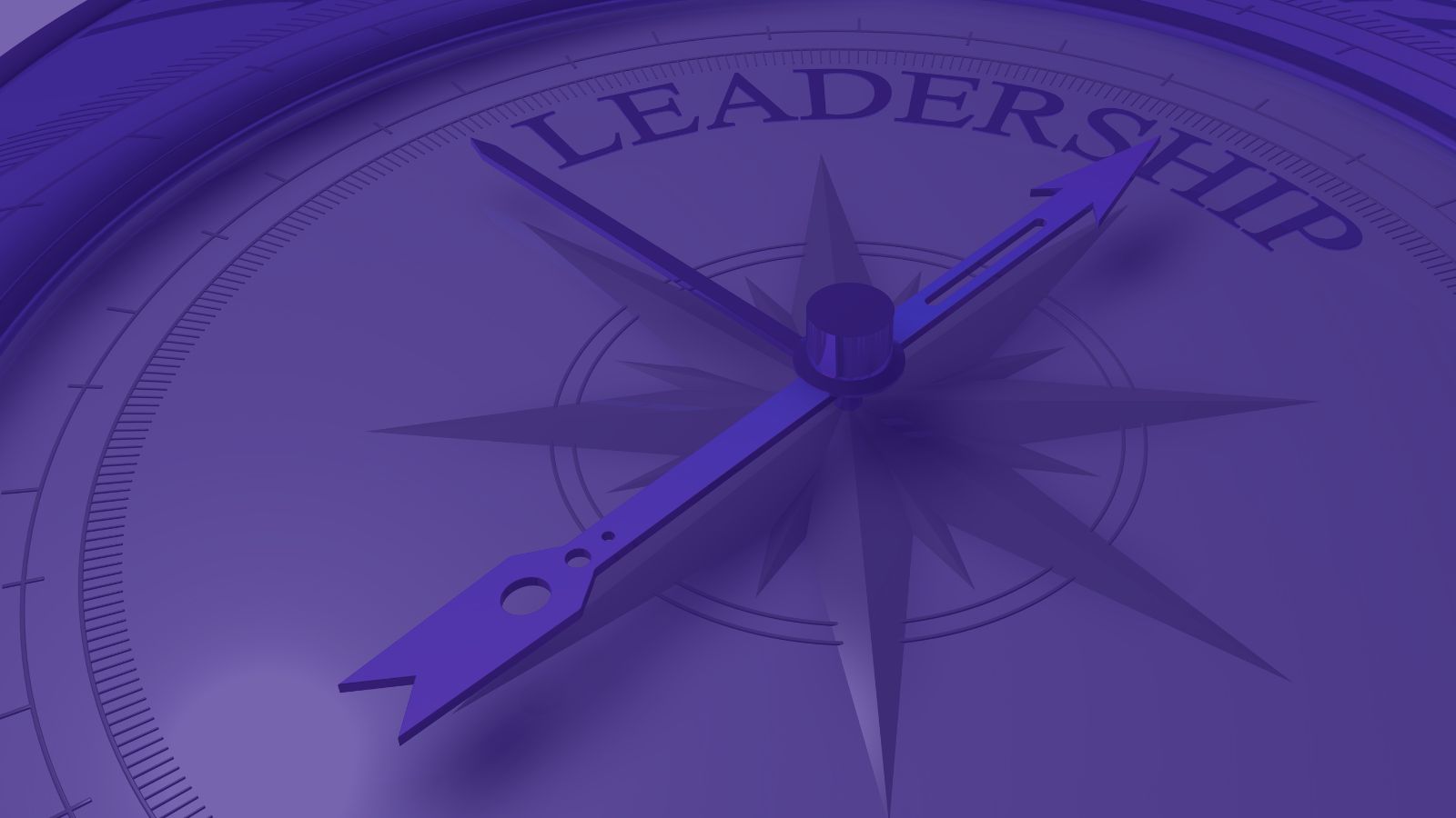 A close-up of a purple compass with a needle pointing towards the word "LEADERSHIP" prominently displayed on the circular dial. The design features a traditional compass rose, emphasizing direction and guidance in a leadership context.